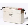 A portable canvas liner cosmetic bag for storage and finishing with a liner250S