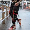 Herenbroek hiphop joggers mannen brief linten lading broek zakken track tactical casual technische techwear mannelijke broek zweetwedstrijden sport streetwear 230225