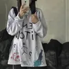 Kvinnors T-skjortor harajuku stil graffiti student basrock koreansk version lös tidig höst konstig långärmad kvinnor kläder
