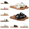 Donnepisti Scarpe da design Muli piatti legnosi sandali Slide vela tela bianca Black Women Shoet Shoeple