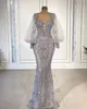 Elegant Mermaid Prom Dresses Long Sleeves V Neck 3D Lace Portrait Appliques Sequins Floor Length Celebrity Hollow Evening Dress Bridal Gowns Plus Size Custom Made