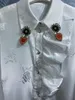 Chemisiers pour femmes 2023 Printemps Mode Chemises Haute Qualité Femmes Col Rabattu Vintage Jacquard Imprimé Floral Chérie Perles Déco Blanc