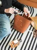 Kobieta Projektant cuir torby wiadro Luksusowe triomphe Kopertówka na ramię Totes bag torebki crossBody Damskie męskie Moda duża pojemność Beach weekend basket bags pochette