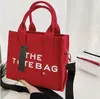 Сумка для сумки высококачественные женщины роскошные дизайнерские сумки холст практические большие простые сумочки для монеты кошелек квадратный кошелек кошелек Crossbody Casual