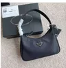 Väskor Koppling Luxurys Design Re-Edition Underarm Bag Nylon Leather Top Women Crossbody Messenger Handbag Totes Purse