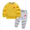 Nieuwe kinderen Kids Brand Print Winter Outfits Katoenen lange mouw broek Kinderen Pak Boy Girl Casual Warme Kleding