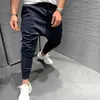 Herrbyxor Nya höst- och vintermän Europeiska och amerikanska joggingbyxor Muskel Fitness Casual Slim Stretch Running Trousers Z0225