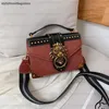 Handväskor för kvinnligt mode Populära flickor Crossbody-väskor Kvinnor Metall Lejonhuvud Märke Axelväska Mini Square Messenger Bag C0602