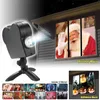 Lawn Lamps Mini Laser Projector Window Show inkluderade 12 rörliga filmer inomhus utomhus scenprojektorer för jul halloween fest