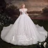 2023 Arabiska vintage En linje Bröllopsklänningar Kristaller Sträng långärmad spetspärlad bollklänning Vestido de Novia Bridal Dress Robes de Mariee