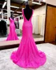 Saudiarabiska Dubai Fuchsia Sequined Mermaid aftonkl￤nningar som kastar V Neckens kv￤llskl￤nning med l￶stagbar Kap L￥ng formell festkl￤nning