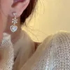 Charm 2022 Nieuwe ingelegde zirkoonbloemen Love Tassel gouden oorbellen voor vrouwen