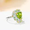 Anelli a grappolo RUZZALLATI Carino romantico a forma di cuore Peridot gemma aperta per le donne Splendido cristallo verde Europa gioielli color argento