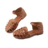 Sandalen Girls Sandalen Kids Strandschoenen 2023 Zomer Gloednieuwe prinses Zoete Exclusieve weven Design Fashion Toecapped Hollow Ademende Z0225