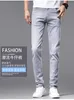 Men's Jeans Designer 2022 light luxury European fashion men's jeans elastic leisure slim fit small footprint flower spring and summer new style 0FXN