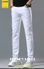 Мужские джинсы дизайнер Дизайнер 2023 новые джинсы мужские легкие роскошные корейские версии тонкие эластичные маленькие брюки для похудения из хлопка чисто белые брюки