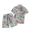23SS Mens Summer Designer Camisas Conjuntos de Calças de Praia Fashion Hawaii Floral Print Camisa Casual Masculina Slim Fit Manga Curta Board Shorts de Praia M-3XL