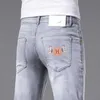 Men's Jeans Designer 2022 light luxury European fashion men's jeans elastic leisure slim fit small footprint flower spring and summer new style 0FXN