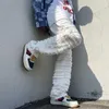 Mäns jeans American Street Hip-Hop Heavy Industry Ripped Spring Straight Loose Vibe Style Skateboard White Fleared Pants 230227