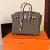 Designer sacos mulheres bolsas 7a artesanal mão cheia costura cera thread 25 30 35 elefante cinza fivela de ouro togo couro frj