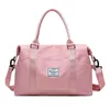 Duffelväskor Travel Bag Women's Portable Clothing Lagring Kort affärsresa Mäns handväska som ska levereras Bagage stor kapacitet