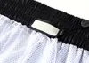 Pantalones cortos de diseñador oficiales del mismo estilo para hombres y mujeres Ropa de calle de moda de verano Traje de baño de secado rápido Pantalones de playa de tablero impreso tamaño s-3XL #GUU