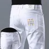 Pantalones vaqueros de diseñador para hombre 2023, pantalones vaqueros de primavera y verano para hombre, versión coreana ligera de lujo, pantalones blancos puros de algodón delgados y elásticos L9ZY