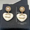 Boucles d'oreilles de perles tahitiennes 18k plaque à or d'or