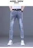 Herren Jeans Designer Männer Modemarke Jugend schlank Fit Small Feet Elastic Heißbohrer Sticker Jeans Hosen WGI4