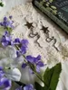 Boucles d'oreilles pendantes originales faites à la main gothique argent plaqué serpent serpent avec des étoiles Boho bohème sorcière Goth céleste