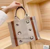 Shoppingväskor Resor Duffle Bag Klassisk Shopping designer Kvinnor Handväskor Woody Tote Shopping Handväska Canvas Linne Stor Beach Lyx Designer Crobody Sho