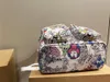 CC MultiCocket ryggsäck deisgner 23SS Mens kvinnor Graffiti Ryggsäckar Flower Nigo Ink Watercolor Leather Blue Sky Cloud Bag Bude Axel Laptop Väskor