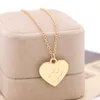 Fashion Cute Gold Love Heart Dog Paw Necklace Designer Woman Mans Silver Pendant Pendant Coupie Sud America Cipts Pendenti Gioielli CHOKERS CHIFICA