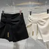 Pantaloncini da donna 2023 Primavera Dolce Fiocco Bottoni Abito a tre punti Gonna Donna Vita alta Bianco Dritto Ragazze Pantaloni corti Moda