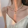 Collier d'amour de perles de luxe léger pour femmes été nouvelle mode conception de niche sens chaîne de clavicule cou polyvalent