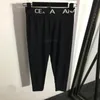 23SS Diseñador de mujer Conjuntos de pantalones de dos piezas con patrón de letras Niñas Milan Runway Jersey Jogging Outwear Camisole Tee Camiseta Crop Tops Chaleco y pantalones Legging Traje de yoga