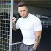 Herren T-Shirts Turnhallen T-Shirt Männer Kurzes Seve Baumwoll-T-Shirt Lässiges dünnes T-Shirt Ma Fitness Bodybuilding Workout T-Shirts Sommerkleidung 0228H23