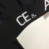 23SS女性デザイナー2ピースパンツ文字付きプリント女の子ミラノ滑走路ジャージージョギングアウトウェアスウェットシャツシャツクロップトップとパンツレギンヨガスーツ