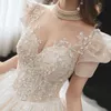2023 Arabo Vintage A Line Wedding Dresses Crystals Sheer Long Aush Ball Abito a sfera di pizzo Vestitido de novi abito da sposa Dubai Robes de Mariee