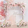 装飾花豪華な結婚式のピンクローズフラワーウォールアーチシーン装飾背景ぶら下がっているコーナー花柄の人工列テーブルボール