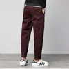 Pantaloni da uomo Pantaloni Harem larghi Pantaloni con cravatta in cotone Piedi Pantaloni Sport Tuta alla moda Uomo Casual Ispessito largo