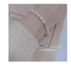 Braccialetti a maglie Catena in argento sterling Bracciale con perle d'acqua dolce naturali Nel design di nicchia Il senso avanzato non sbiadisce la pace spezzata