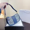 Nya kvällspåsar designers kvinnor väskor luxurys axelväska mode underarm tote handväska crossbody vintage hög kvalitet klassisk bokstav blå handväska 230223