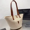 Borsa per la spesa in tessuto Borse da spiaggia Borse firmate Moda Hardware Lettere Scava fuori Borse tessute Paglia Shopping Vacanze Estate Tasca interna con cerniera Fondo tondo