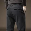 Мужские брюки осень зима высококачественные растягиваемые брюки для ткани мужчина толстая эластичная талия хлопковая стройная бизнес черные голубые брюки 230228
