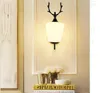 Personalidade criativa da lâmpada de parede estilo nórdico Antler europeu Led a cabeceira da sala de estar interna de fundo