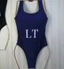 Lyxhemtextil halter simning dräkt kvinnor bikini sexig slitage kvinnlig ihålig monokini svart baddräkt vadderad simning solid bodysuit med