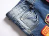 DSQ2 Cool Guy Uomo Blu Hip Hop Rock Moto Design da uomo Strappato Denim Distressed Biker DSQ Jeans estivi Corti 1121