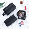 bolsa de maquillaje transparente negro