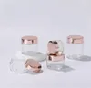 Hot Selling Clear Glass Jar Cream Bottle Cosmetic Container med Rose Gold Lid 5G 10G 15G 20G 30G 50G 100G Packing -flaskor JL5689